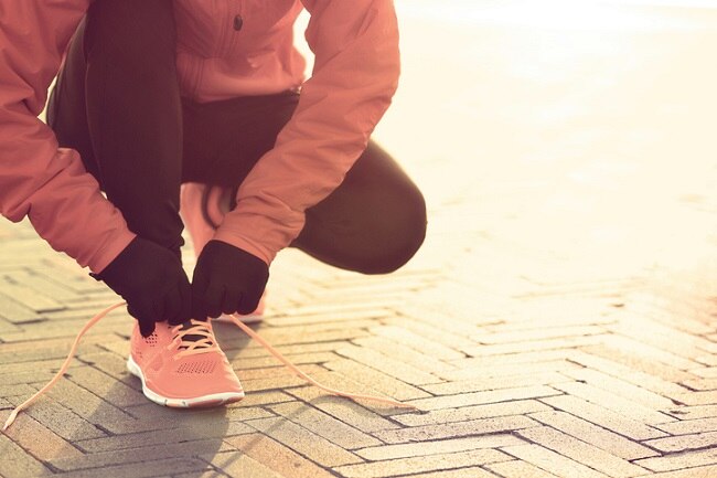 5 Fitness Tips to Stay Healthy Over the Holidays Woman Gets Ready to Run to Stay Healthy During Holidays | Vitacost.com/blog