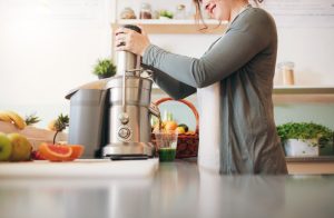 Woman Following Detox Diet Juicing Fresh Fruits and Vegetables | Vitacost.com/blog