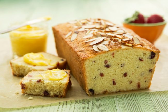 Cranberry-Almond Whole Wheat Bread Recipe A loaf and slices of whole wheat bread with almonds and cranberries | Vitacost.com/blog