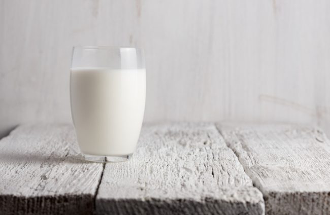 Glass of Plant-Based Almond Milk on Wooden Table | Vitacost.com/blog
