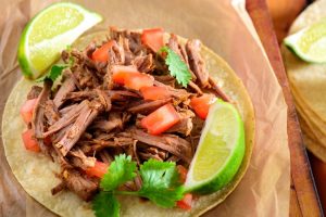 Tortilla Filled with Slow Cooker Pulled Pork, Lime & Tomatoes | Vitacost.com/blog