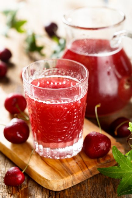 Cherry drinking vinegar on wood | Vitacost.com/blog