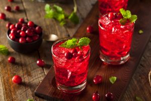 Cranberry drinking vinegar on wood | Vitacost.com/blog