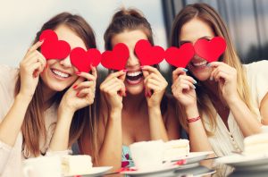 3 Friends Holding Red Hearts in Celebration of Galentine's Day | Vitacost.com/blog