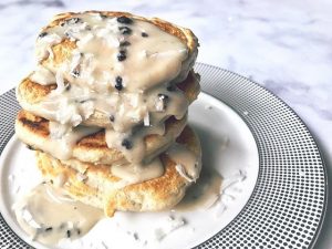 Blueberry Oat Flour Pancakes on White Plate with Protein Syrup | Vitacost.com/blog