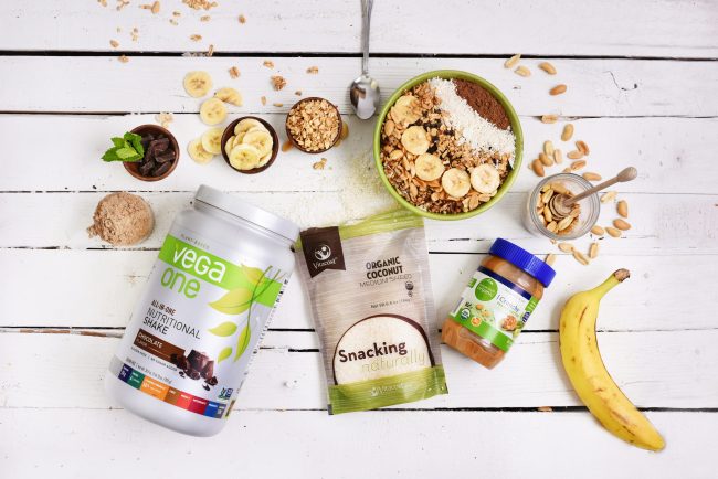 Chocolate Peanut Butter Smoothie Bowl Smoothie Bowl with Ingredients Scattered Around | Vitacost.com/blog