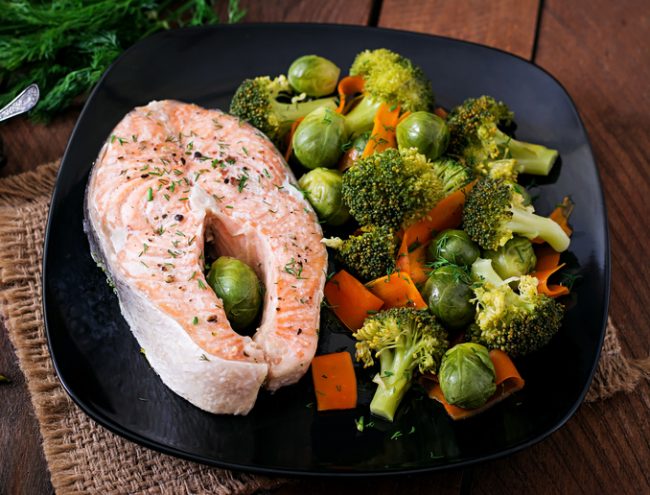 Baked Salmon Steak on Black Plate with Roasted Vegetables | Vitacost.com/blog