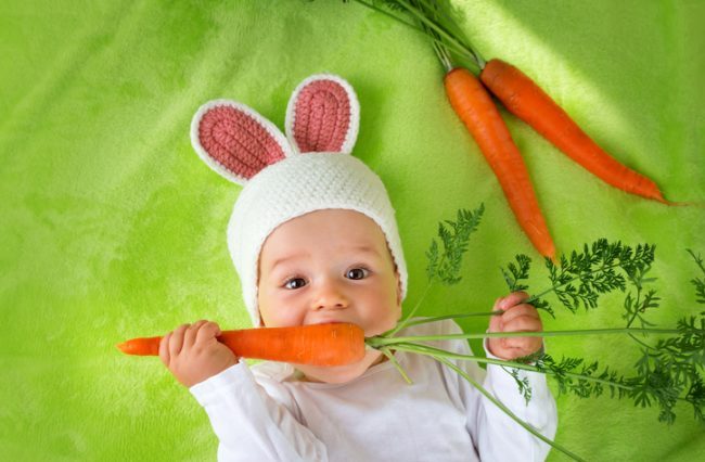 Vegan Baby in Bunny Suit Munching on Carrot | Vitacost.com/blog
