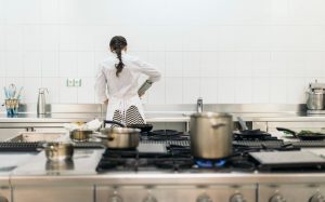 Woman in White Apron Cooking Sous Vide in a Modern Kitchen | Vitacost.com/blog
