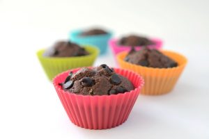 5 Zucchini Chocolate Chip Muffins in Neon-Colored Silicone Liners on White | Vitacost.com/blog