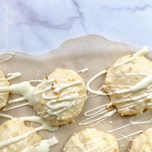 Coconut Macaroons with White Chocolate Drizzle on Parchment Paper | Vitacost.com/blog