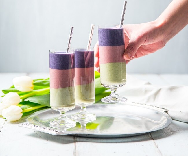 How to Make a 3-Layered Fruit Smoothie  Woman Picks One of Three Tri-Colored Fruit Smoothie Glasses from Silver Tray | Vitacost.com/blog