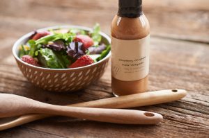 Strawberry & Greens Salad in Wooden Lattice Bowl With Dressing That's High in Hidden Sugar | Vitacost.com/blog