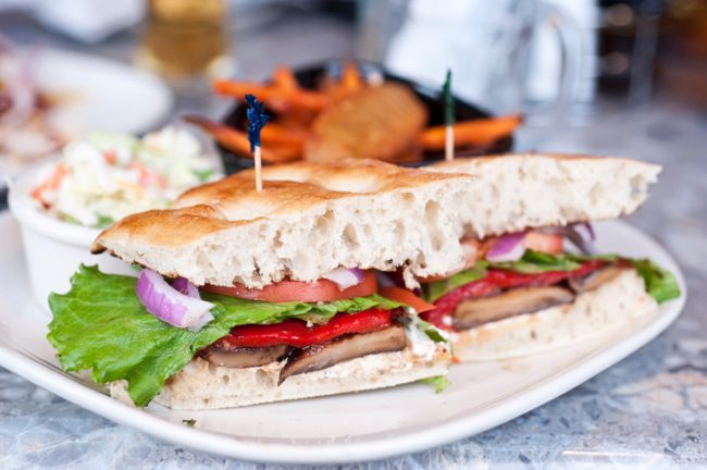 Roasted Vegetable Sandwich Recipe  Sandwich with Roasted Vegetables on White Plate | Vitacost.com/blog