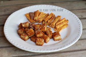 White Plate with Spicy Baked Tofu & Sweet Potato Fries | Vitacost.com/blog
