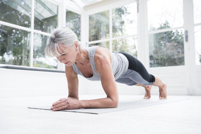 Woman in Forearm Plan to Relieve Lower Back Pain | Vitacost.com/Blog