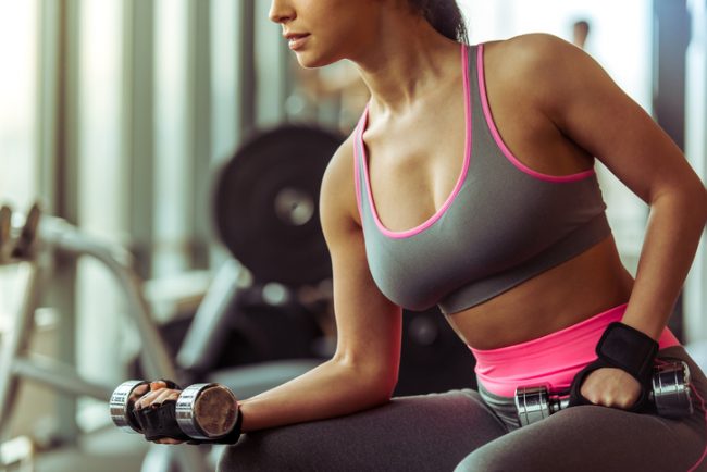 Woman Mindfully Performing Biceps Curl at Gym | Vitacost.com/Blog