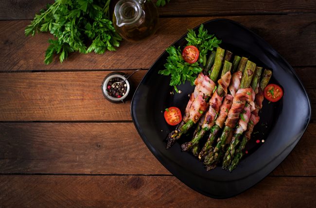 Oven-Baked Bacon Wrapped Asparagus with Greens and Tomatoes | Vitacost.com/Blog