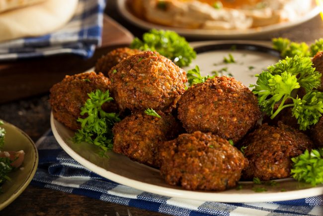 Baked Falafel Recipe with Cauliflower & Chia  Baked Falafel Balls on Plate with Dip | Vitacost.com/blog