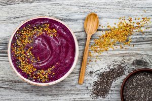 Berry Beet Smoothie Bowl with Bee Pollen & Chia on Wood with Wooden Spoon #recipe| Vitacost.com/blog