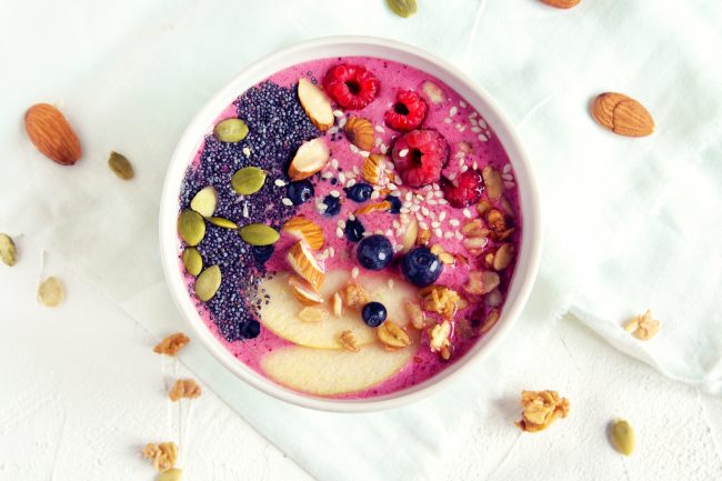 Pink Acai Smoothie Bowl on White Table Shows Collagen in Food is Delicious | Vitacost.com/blog