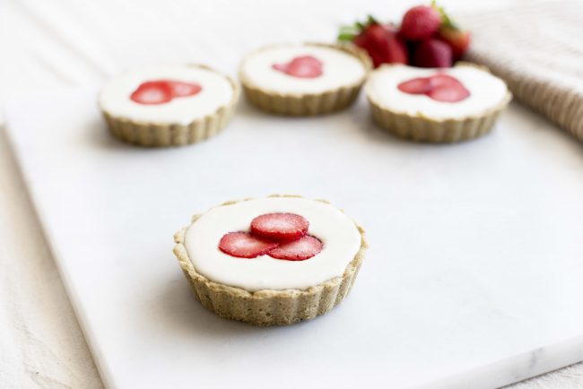 4 Strawberry Cream Cheese Tarts with One in the Forefront #recipe | Vitacost.com/blog