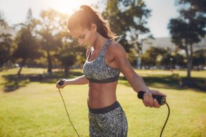 Woman Jump Roping in Park for Calorie-Torching Workout | Vitacost.com/Blog
