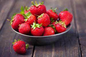 Ripe Strawberries in Bowl on Wood Table | Vitacost.com/Blog