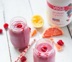 2 Grapefruit Lemonade Smoothie Drinks in Jars on Wood with Fruit Slices #recipe | Vitacost.com/blog