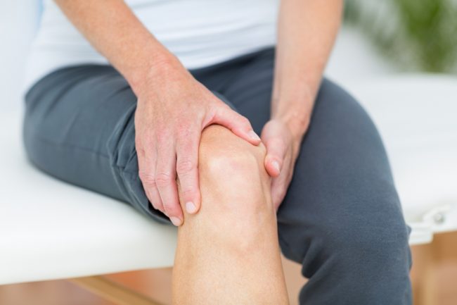 Bone-Healing Recovery Food & Tips  Close-up of Woman Holding Knee Because She Needs Bone Healing Recovery Food | Vitacost.com/blog