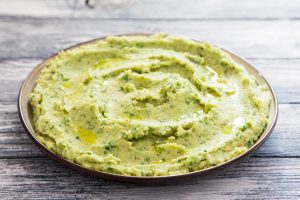 Sweet Pea Cilantro Dip in Bowl on Wood Background | Vitacost.com/blog