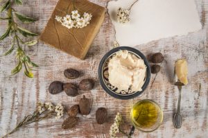 Different Forms of Skin-Spoiling Shea Butter on Wooden Table | Vitacost.com/blog