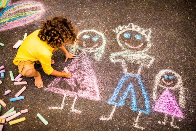 Boy Drawing Picture of His Family with Chalk | Vitacost.com/Blog