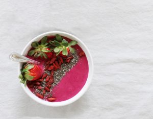 Vegan Berry Beet Smoothie with Chia Seeds in White Bowl on Marble Counter | Vitacost.com/blog