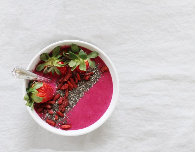 Berry Vegan Smoothie Bowl with Beets Vegan Berry Beet Smoothie with Chia Seeds in White Bowl on Marble Counter | Vitacost.com/blog