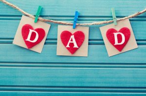 Banner Spelling Out Dad Hung on Clothesline to Celebrate Father's Day | Vitacost.com/blog
