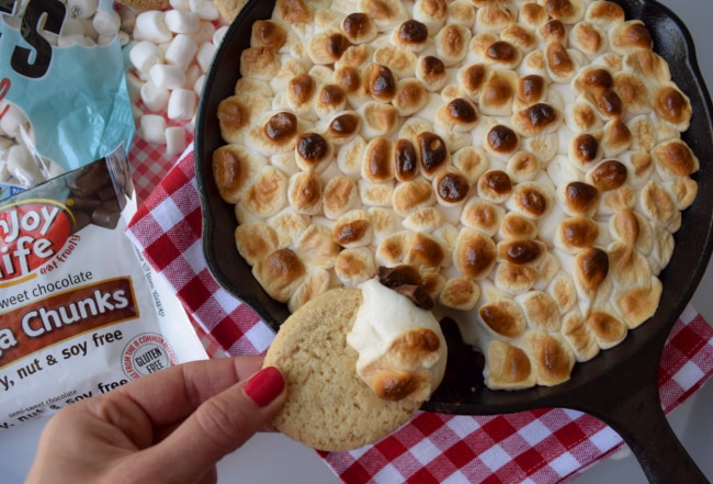 Hand Dipping Cookie in Gluten-Free Baked S'mores Dip | Vitacost.com/Blog