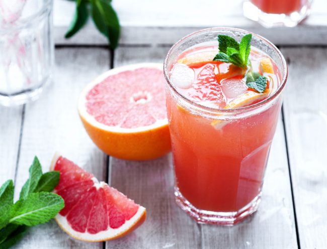 Healthy Happy Hour Drinks with Grapefruit & Drinkable Probiotics on Wood Table | Vitacost.com/blog