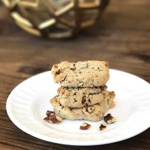 3 Pecan Shortbread Cookies Stacked on White Plate on Wood Table #recipe | Vitacost.com/blog
