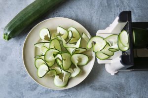 Prepping Summer Produce by Using Spiralizer to Cut Zucchini into Ribbons | Vitacost.com/blog