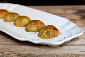 Baked Mushroom Bites on White Plate on Wood Bench | Vitacost.com/blog