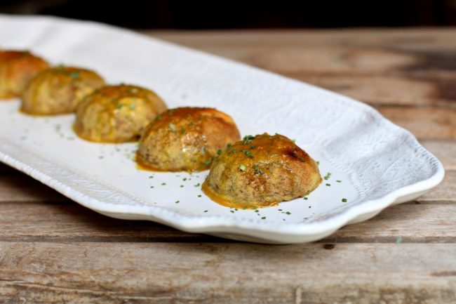 Vegan & Gluten-Free Baked Mushroom Bites  Baked Mushroom Bites on White Plate on Wood Bench | Vitacost.com/blog