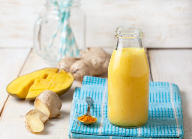 Benefits of Turmeric + Turmeric Smoothie Recipe  Mango Turmeric Smoothie in Glass Jar | Vitacost.com/blog