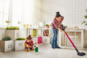 Woman & Daughter Decluttering and Cleaning Playroom to Get Organized | Vitacost.com/blog
