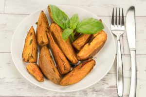Par-Baked and Grilled Sweet Potato Wedges on White Plate | Vitacost.com/blog