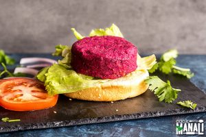 Homemade Vegan Chickpea-Beet Burger on Bun with Lettuce and Tomato | Vitacost.com/Blog