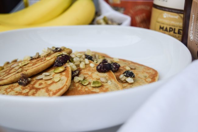 5 Dairy-Free Pancakes on White Plate with Bananas, Nut-Free Trail Mix & More | Vitacost.com/blog