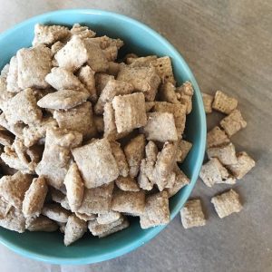 White Chocolate Puppy Chow Recipe in Blue Bowl on Wood Table | Vitacost.com/blog