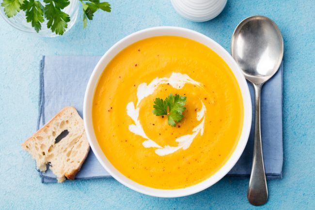 Creamy Sweet Potato Soup Creamy Sweet Potato Soup with Coconut Milk Swirl on Blue Table | Vitacost.com/blog