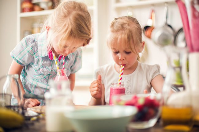 Two Young Girls Sipping on Homemade Smoothies | Vitacost.com/Blog